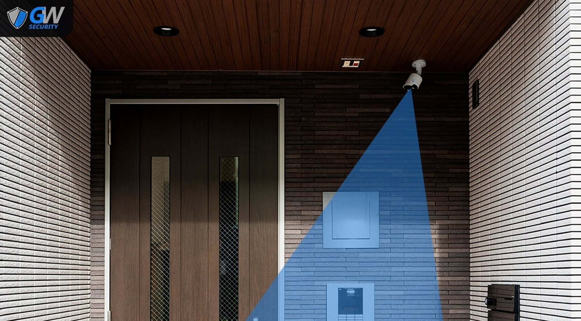 Security camera mounted above a modern front door with a blue overlay illustrating its motion detection field of view.